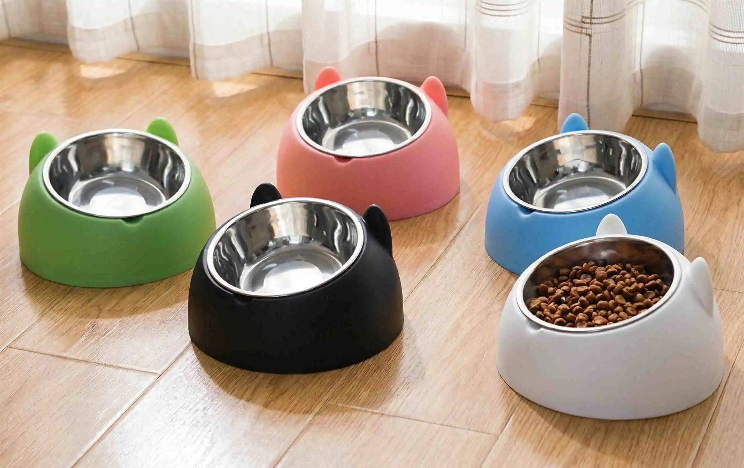 Tilted split pet feeding bowl