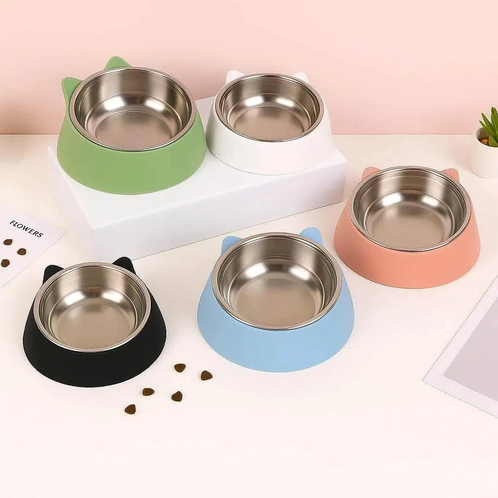 Tilted split pet feeding bowl