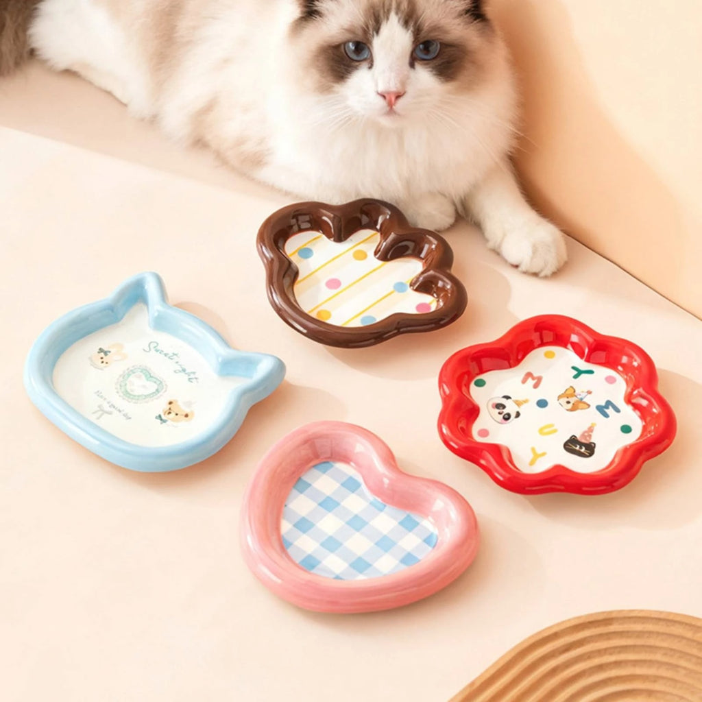 Various shapes of pet feeding bowls